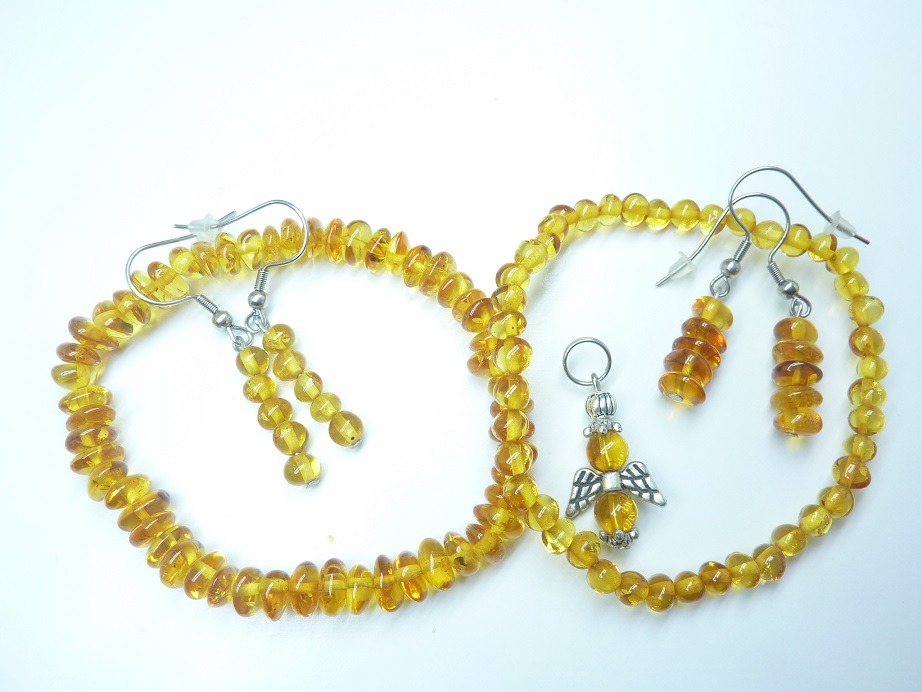 Bijoux pendentif , bracelet, boucles d'oreilles Ambre